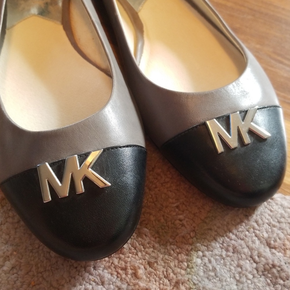 Michael Kors grey and black ballet flats.